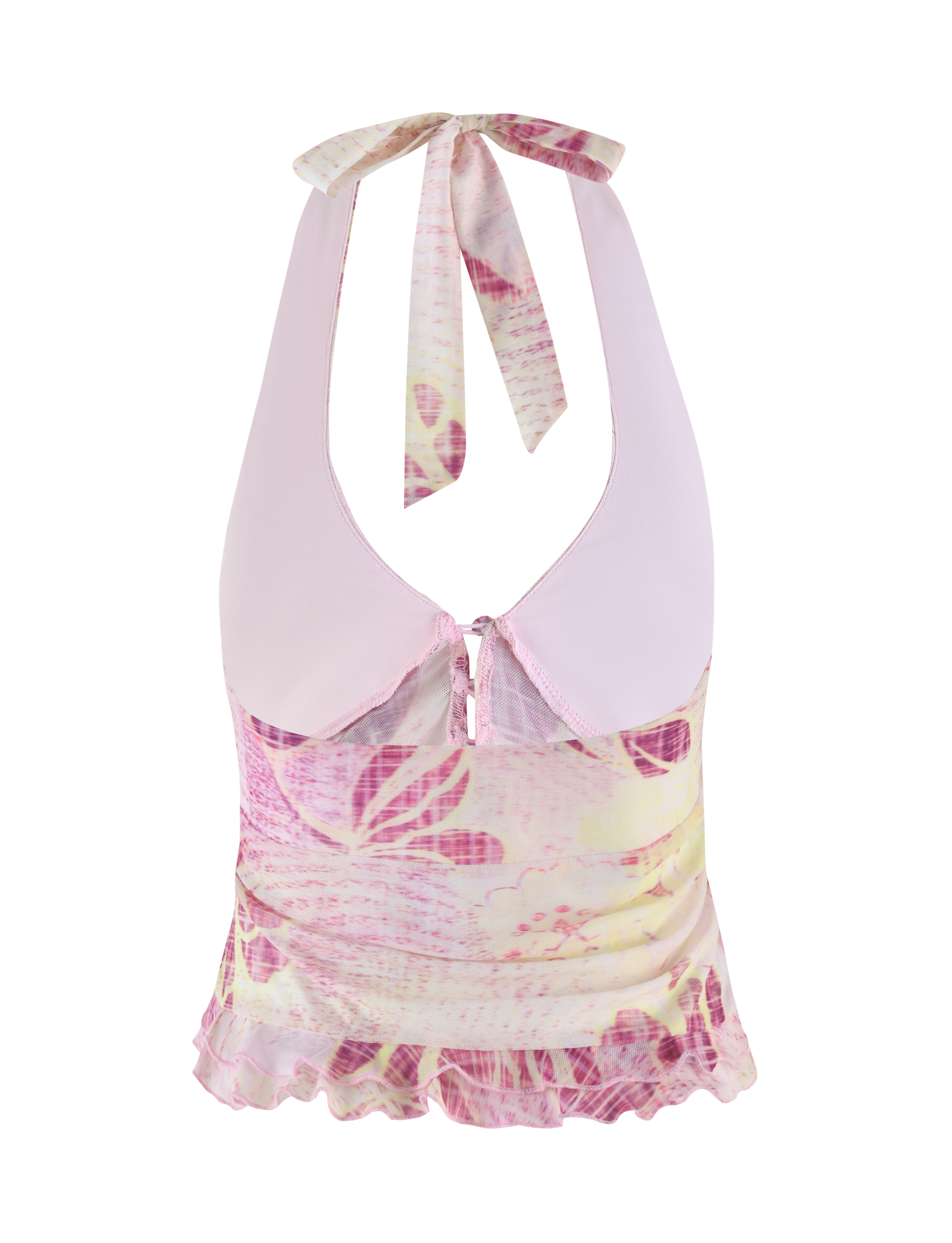 The DALILA TOP - GRUNGE FLORAL MAGENTA by TIGERMIST features a sleeveless halter design with a light pink collar, exclusive pink and yellow floral print, keyhole neckline with back ties, ruffled hem, and soft high-stretch semi-sheer fabric.