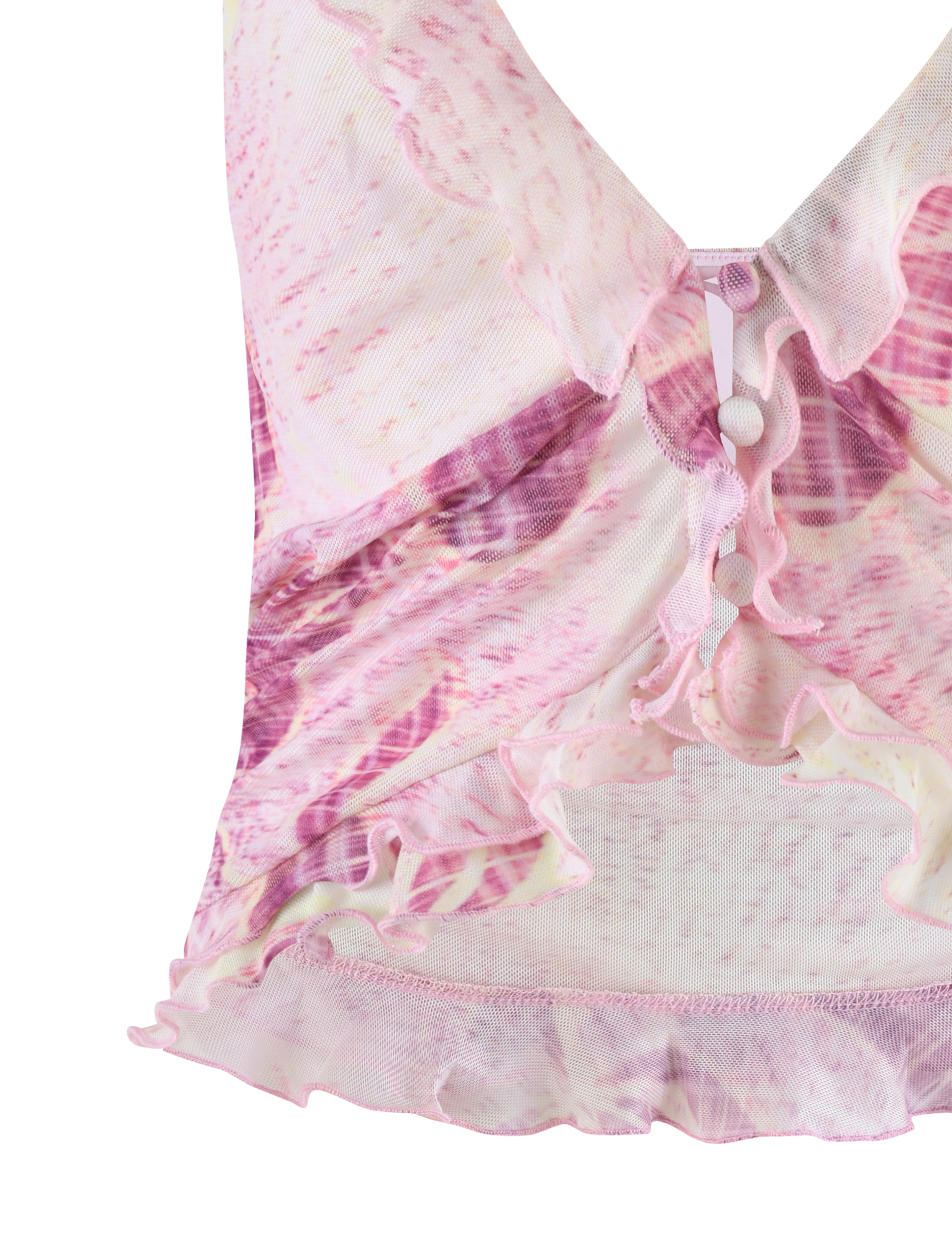 A close-up of the TIGERMIST DALILA TOP - GRUNGE FLORAL MAGENTA, featuring pink and purple sheer fabric, an exclusive wavy abstract print, decorative buttons, and layered ruffle edges.