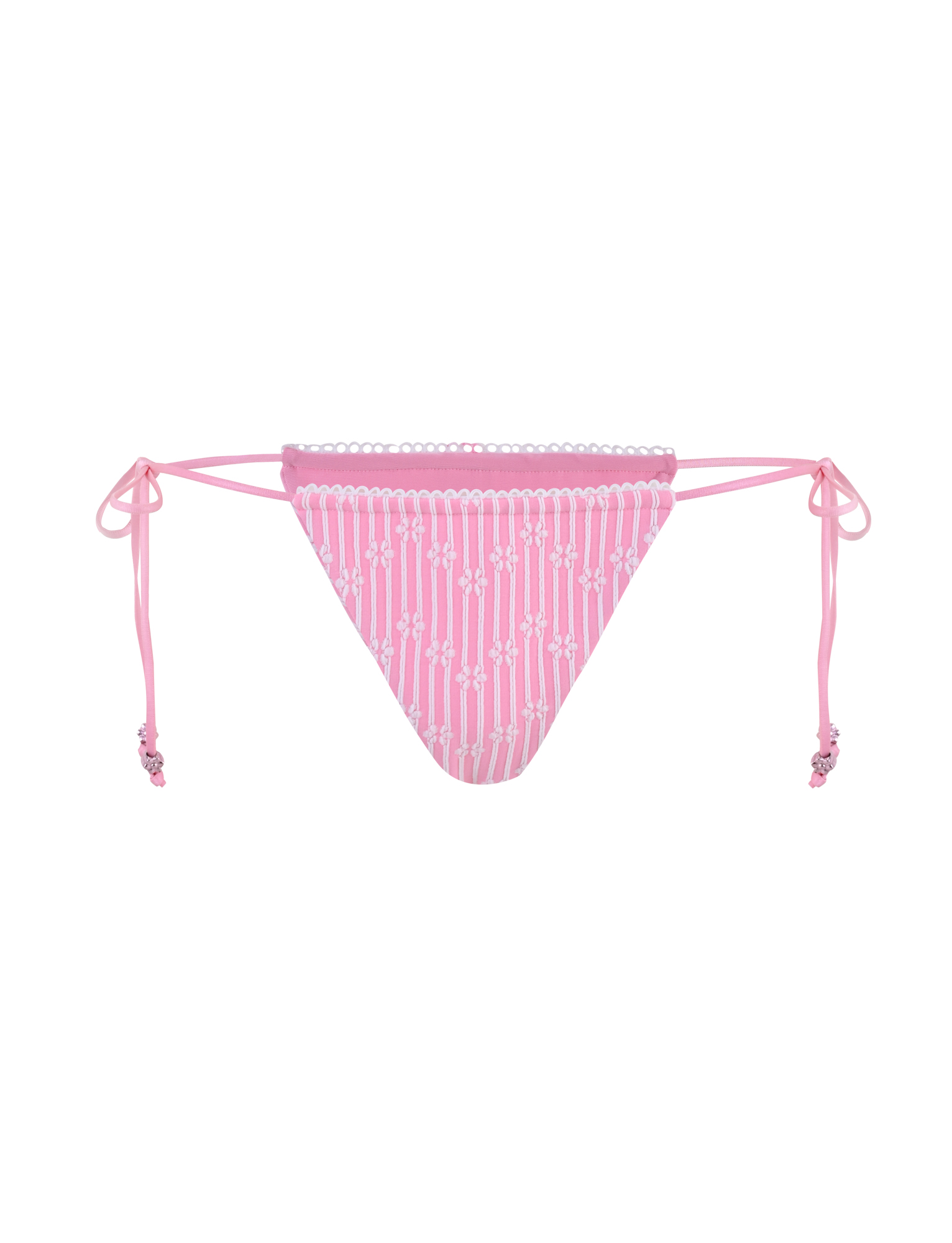 The SAHRA BIKINI 2PC BOTTOM - PINK FLOWER STRIPE by TIGERMIST is a pink bikini bottom in a textured rib fabric with white geometric patterns and side ties accented by small pink beads.