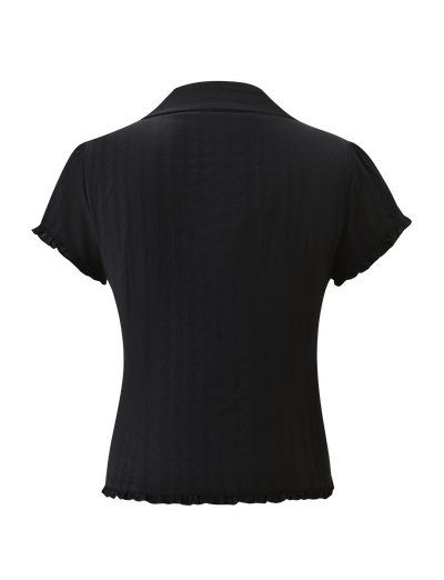 Back view of the TIGERMIST VALERIE SHORT SLEEVE SHIRT - BLACK, a collared woven shirt with short sleeves and subtle ruffle details at the hem and sleeve edges, shown on a plain white background.