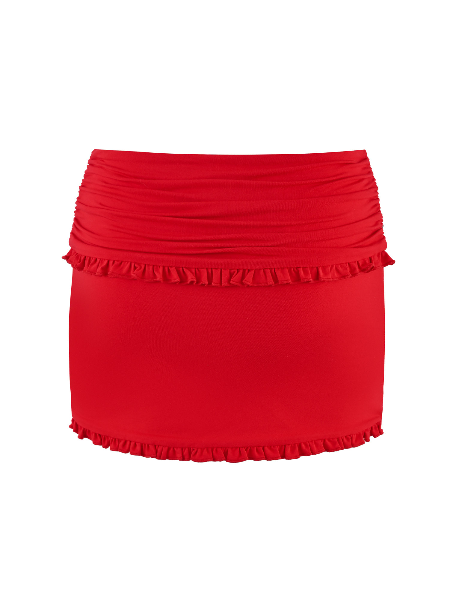 The GINNY SKORT - RED by TIGERMIST is a red, high-waisted mini skort with a bodycon fit, featuring ruching and ruffle details along the top and bottom edges, shown on a white background.