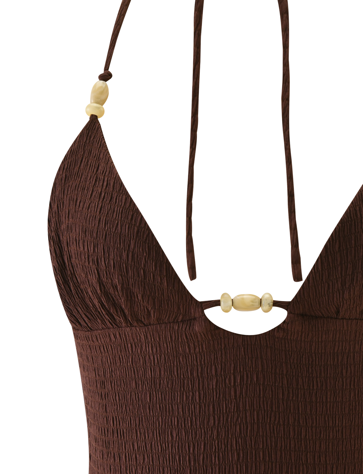 Close-up of the TIGERMIST ZINNIA TOP in chocolate: a textured knit swimsuit top with a deep V-neckline, thin halter straps, and decorative light-colored beads at the neckline and straps. Set against a plain white background.