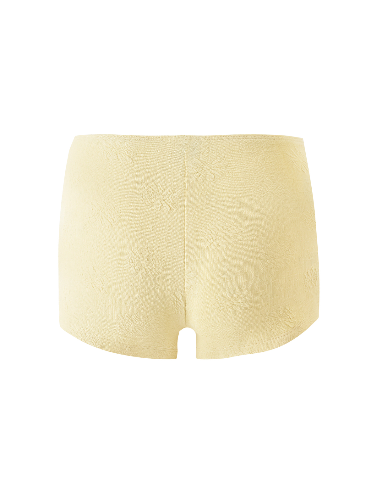 The TIGERMIST QUINLAN SHORT - LEMON is a high-waisted women's underwear in light yellow with delicate floral details and a subtle pattern, shown from the back against a white background.