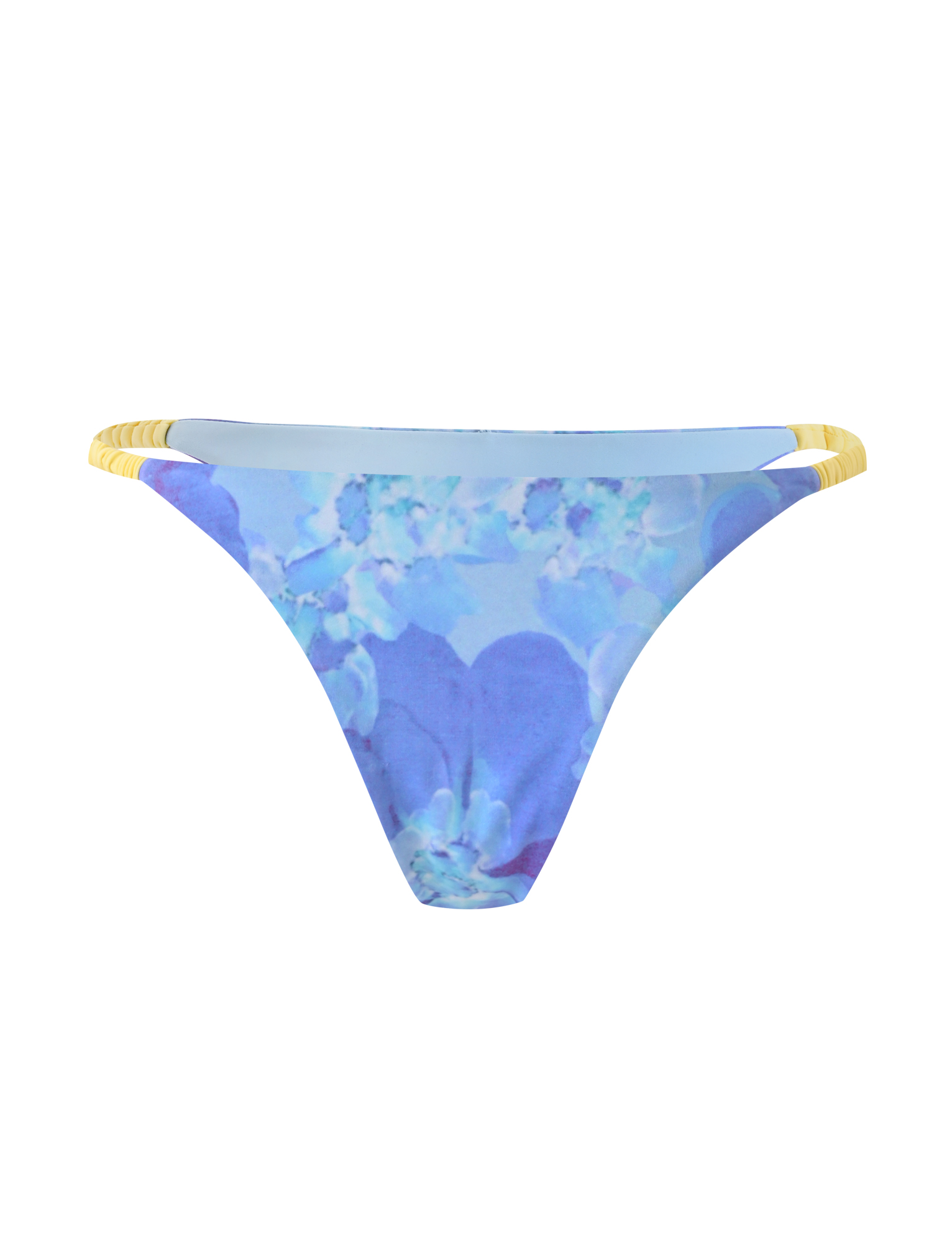 The TIGERMIST EMBERLAIN BIKINI BOTTOM - BLUE MACRO FLORAL features a low-rise bodycon fit with blue floral print and thin yellow side straps, shown on a white background.