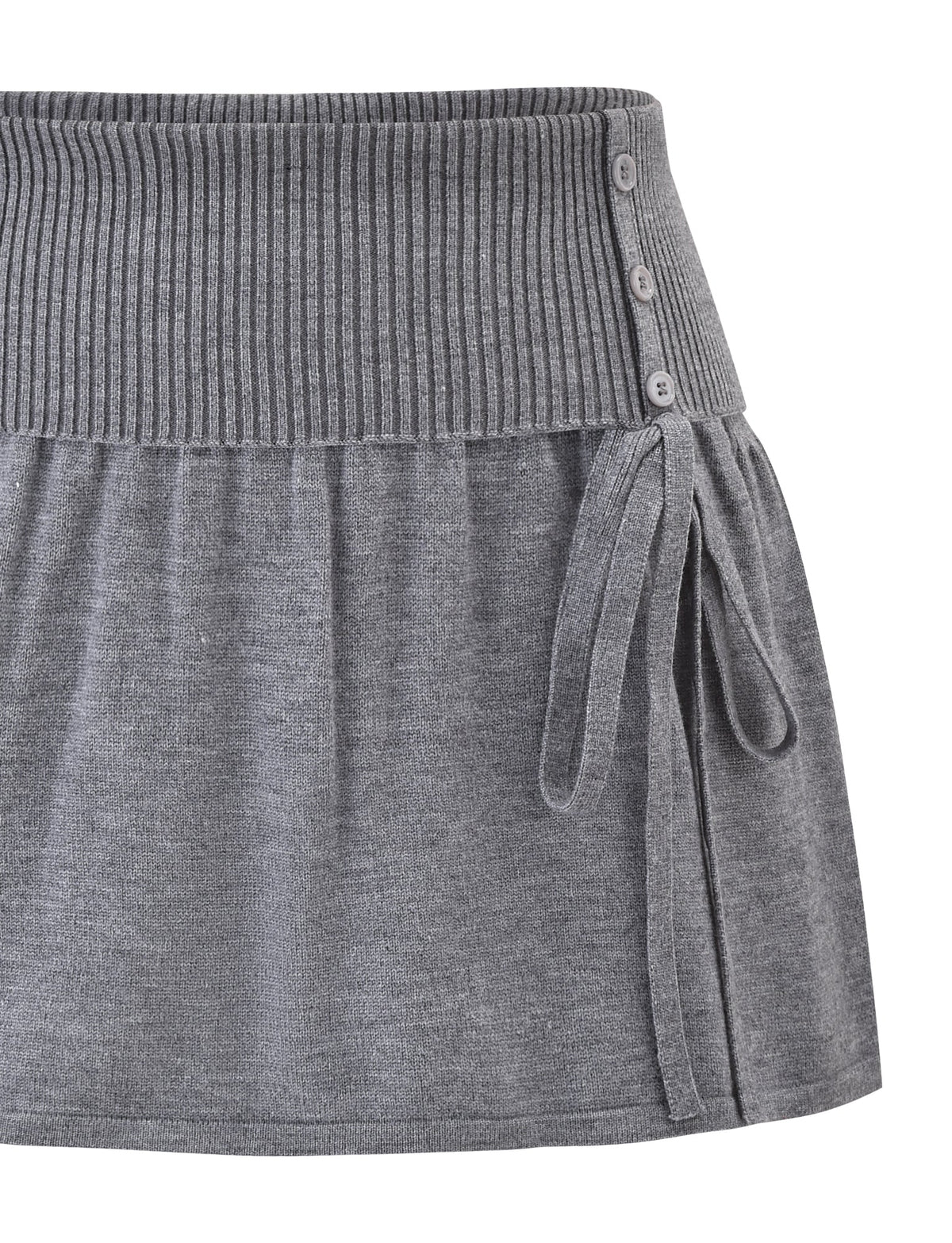 The TIGERMIST ROWENA MINI SKIRT - GREY features a wide ribbed waistband, three side buttons, and two fabric ties. Its soft, pull-on design offers comfort and easy wear.