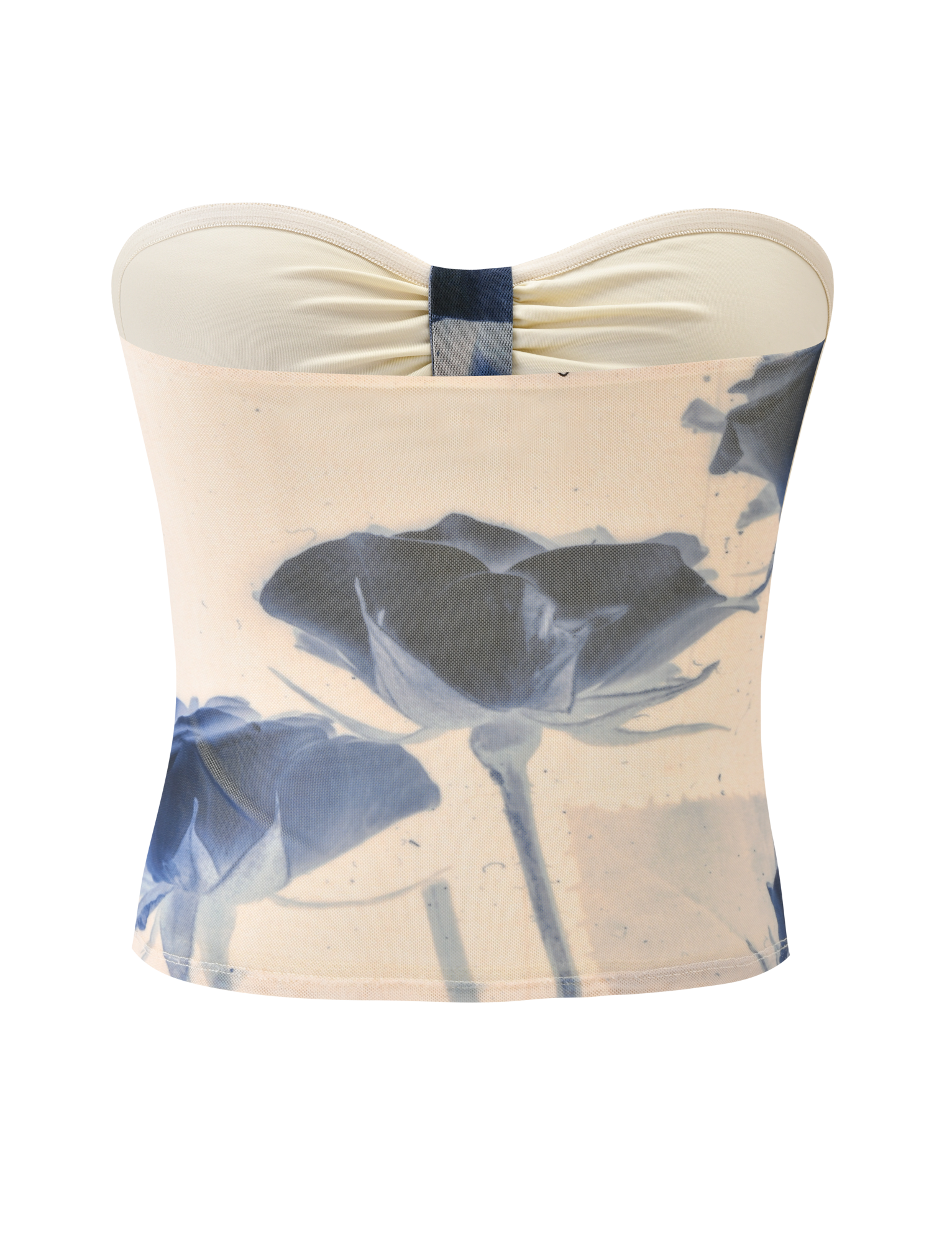 The JANIS TOP - INDIGO FLORAL by TIGERMIST is a strapless beige tube top with a center knot, bold blue rose print, and an artistic floral mesh design on the front.