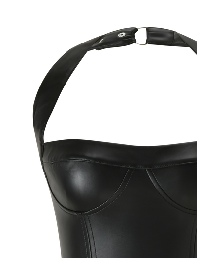 Close-up of the TIGERMIST EMERALD TOP - BLACK, a faux leather corset halter with a neck strap featuring a metallic ring and snap button, structured stitching, and a shiny finish.