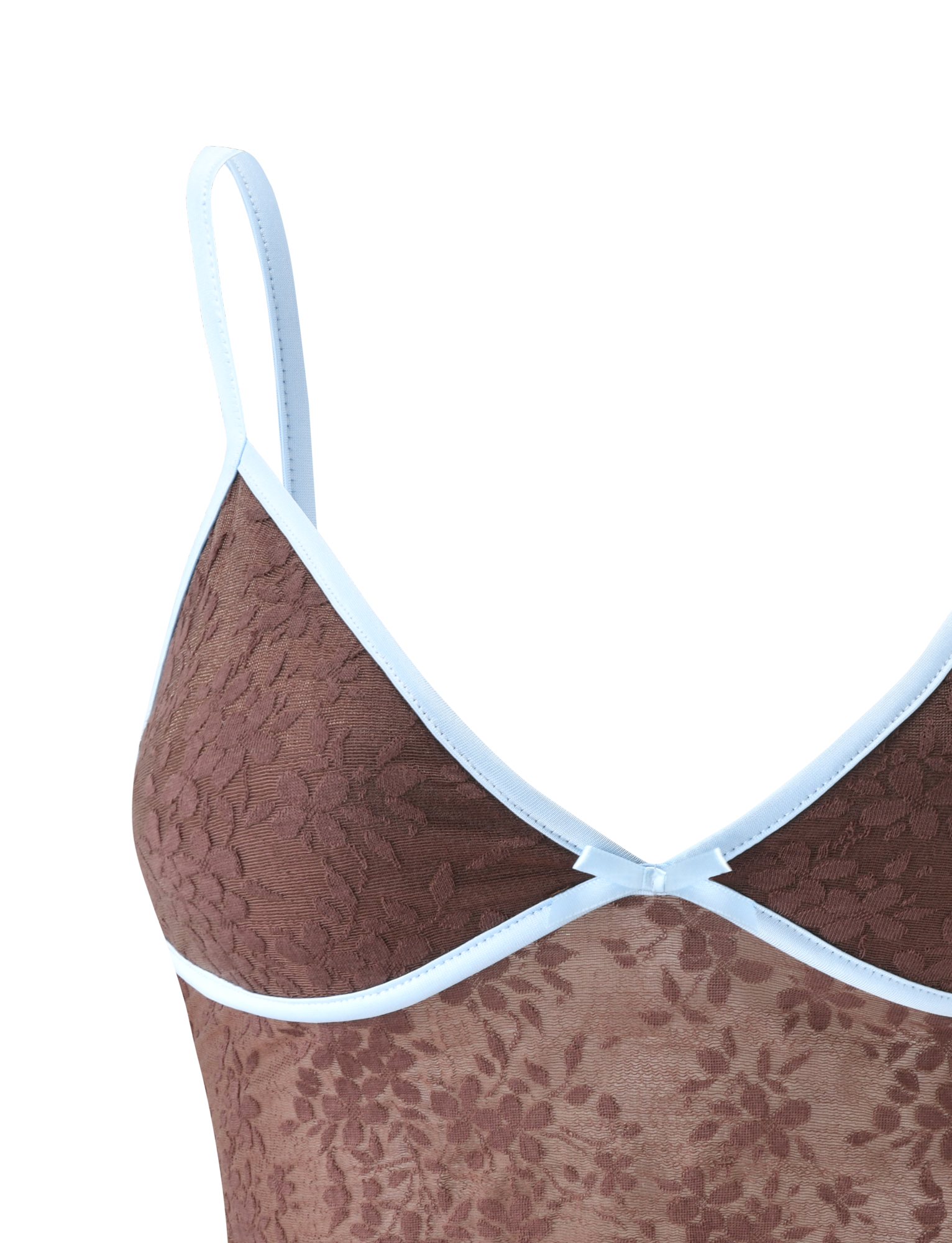 Close-up of the TIGERMIST AUBURN TOP - CHOCOLATE, a brown lace cami with white trim, adjustable straps, delicate floral pattern, and a small decorative accent at the center neckline.