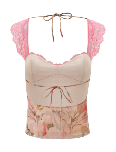 The TIGERMIST DUNE TOP - WATERCOLOUR FLORAL is a sleeveless, light pink lace top with cap sleeves, sheer panels, adjustable tie back, and delicate neck tie, shown against a white background.