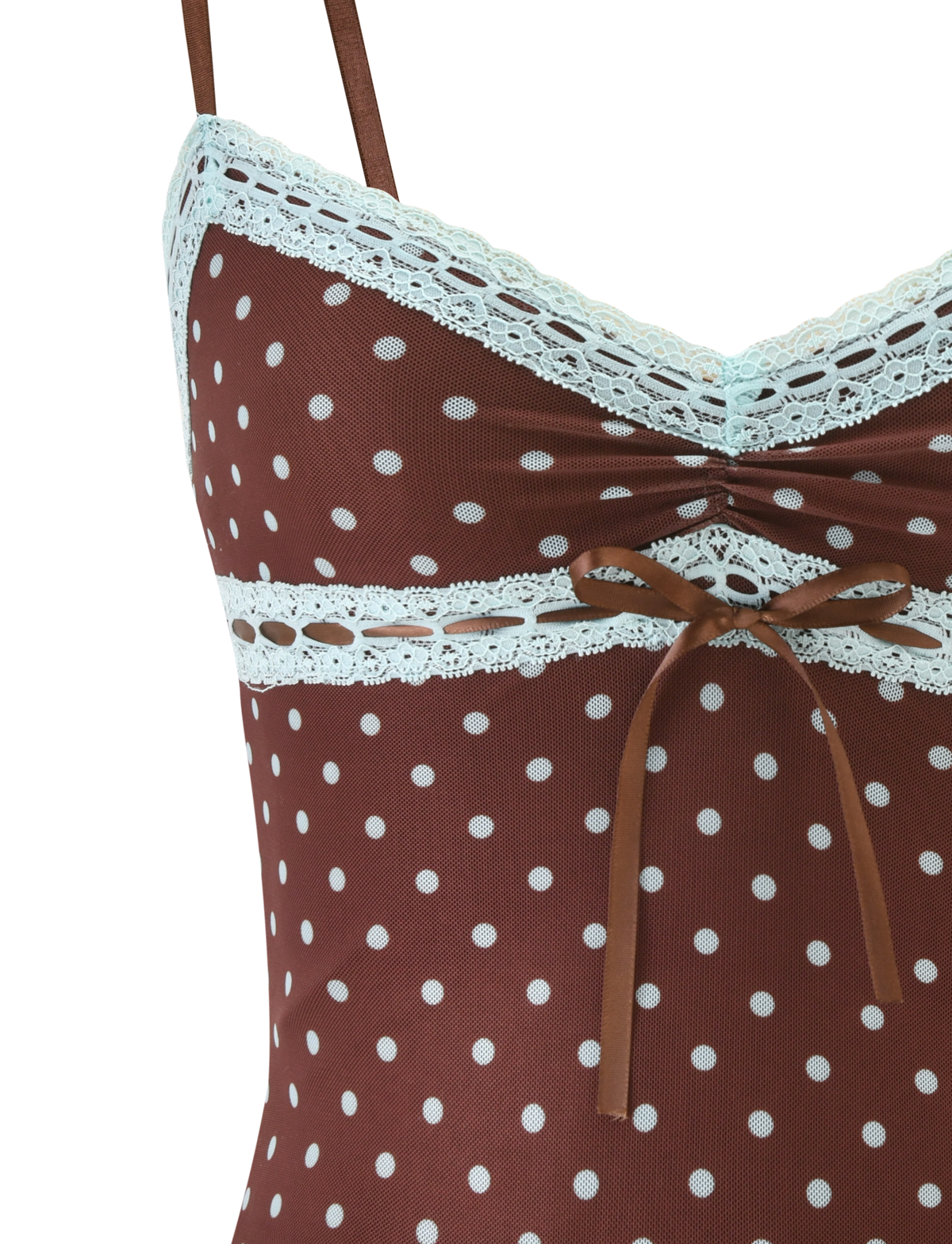 Close-up of the TIGERMIST AMARA TOP - POLKA DOT: a brown mesh cami with white polka dots, delicate lace trim at the neckline and underbust, plus a small brown ribbon bow below the bust.