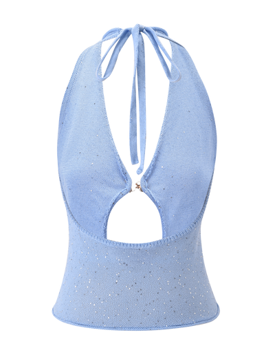 The AZURA TOP - BLUE by TIGERMIST is a light blue glitter halter with a plunging neckline, tie neck, open back, and small circular cutout below the bust. Subtle sparkly embellishments add a shimmering finish.