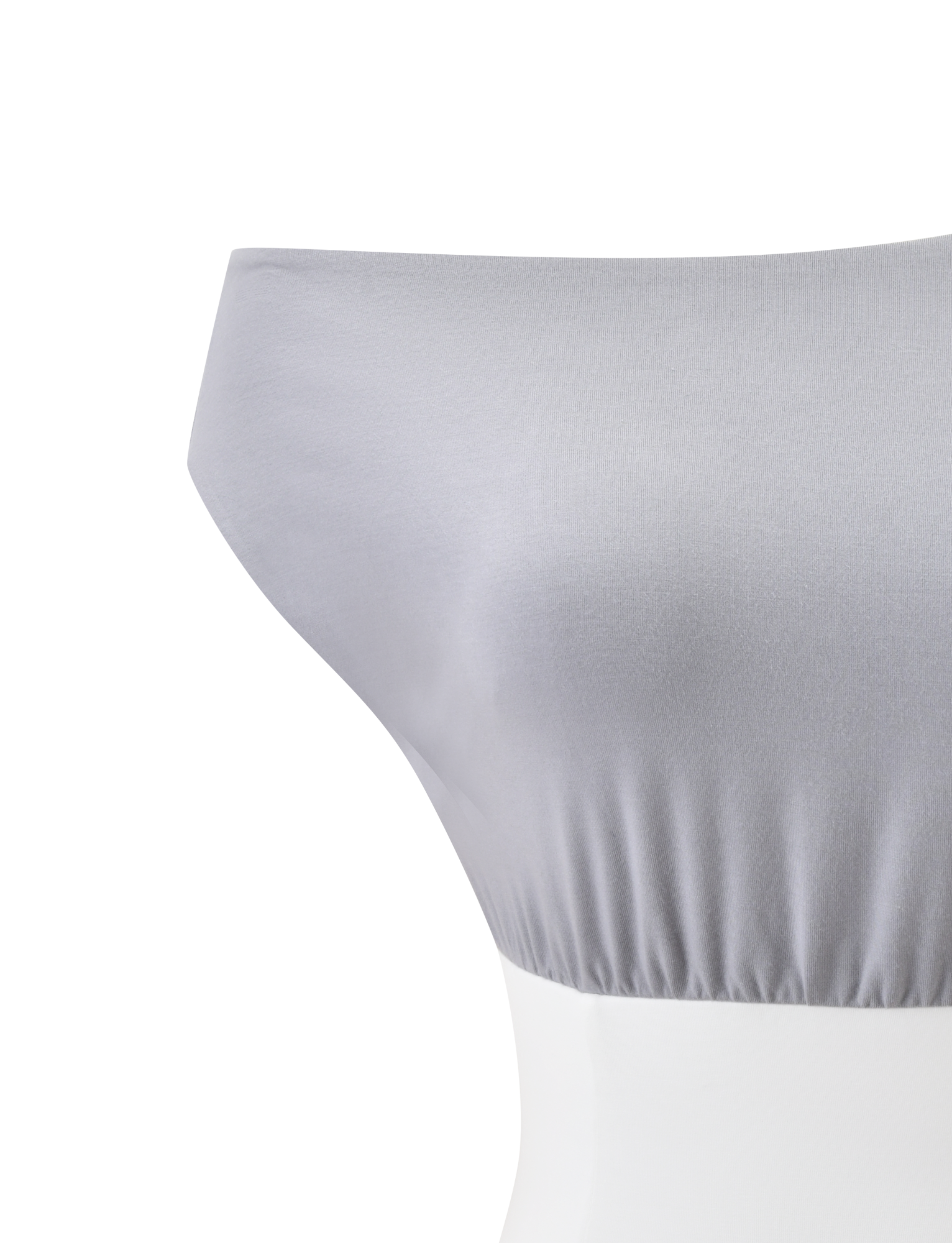 The TIGERMIST ALYSSA OFF SHOULDER TOP in grey is displayed on a mannequin, showcasing its smooth fabric, off-shoulder neckline, and gathered elastic detail under the bust.