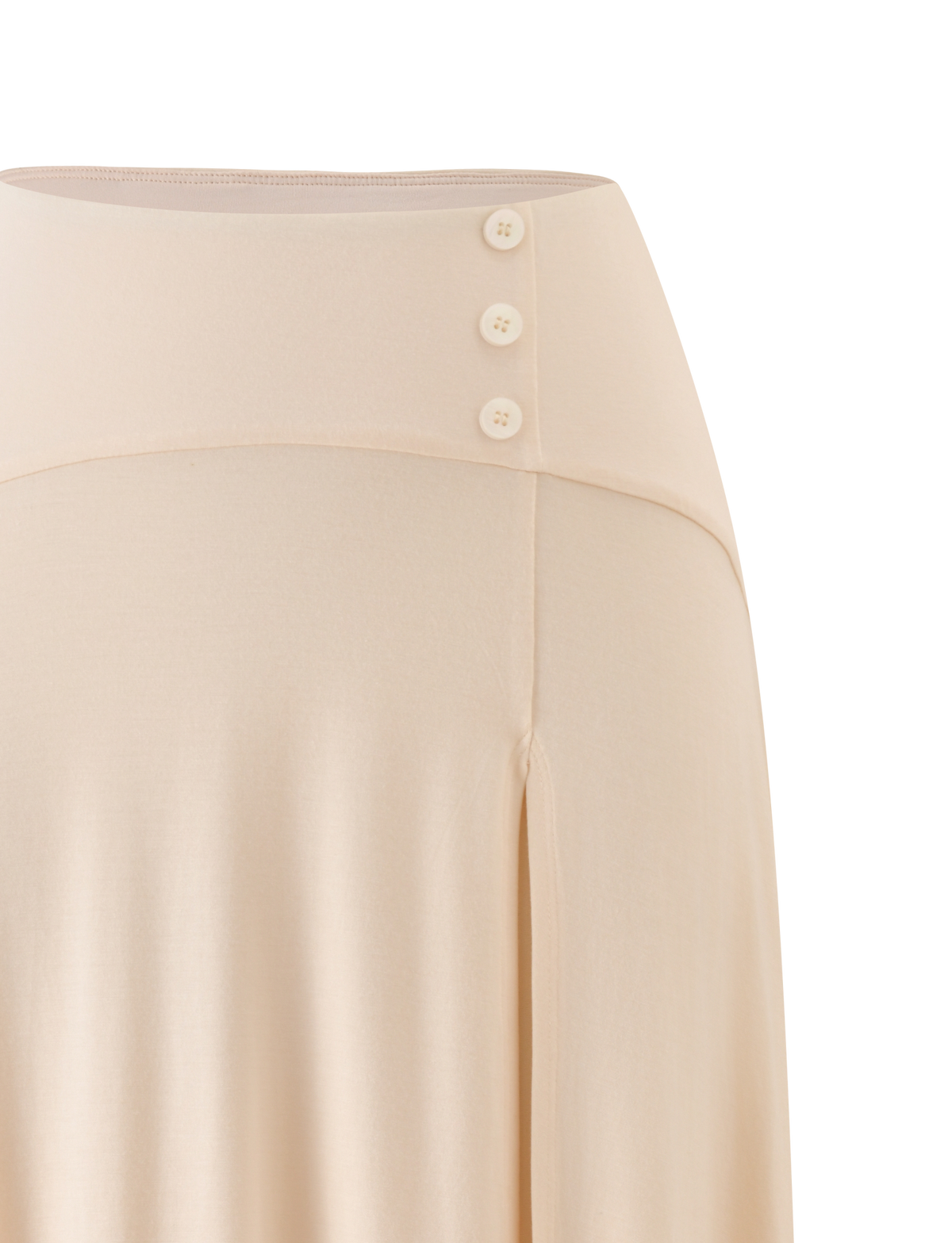 The TIGERMIST ALYSSA HI LO SKIRT in cream showcases a high waistband with three round side buttons, soft flowing fabric, and a stylish front leg slit.