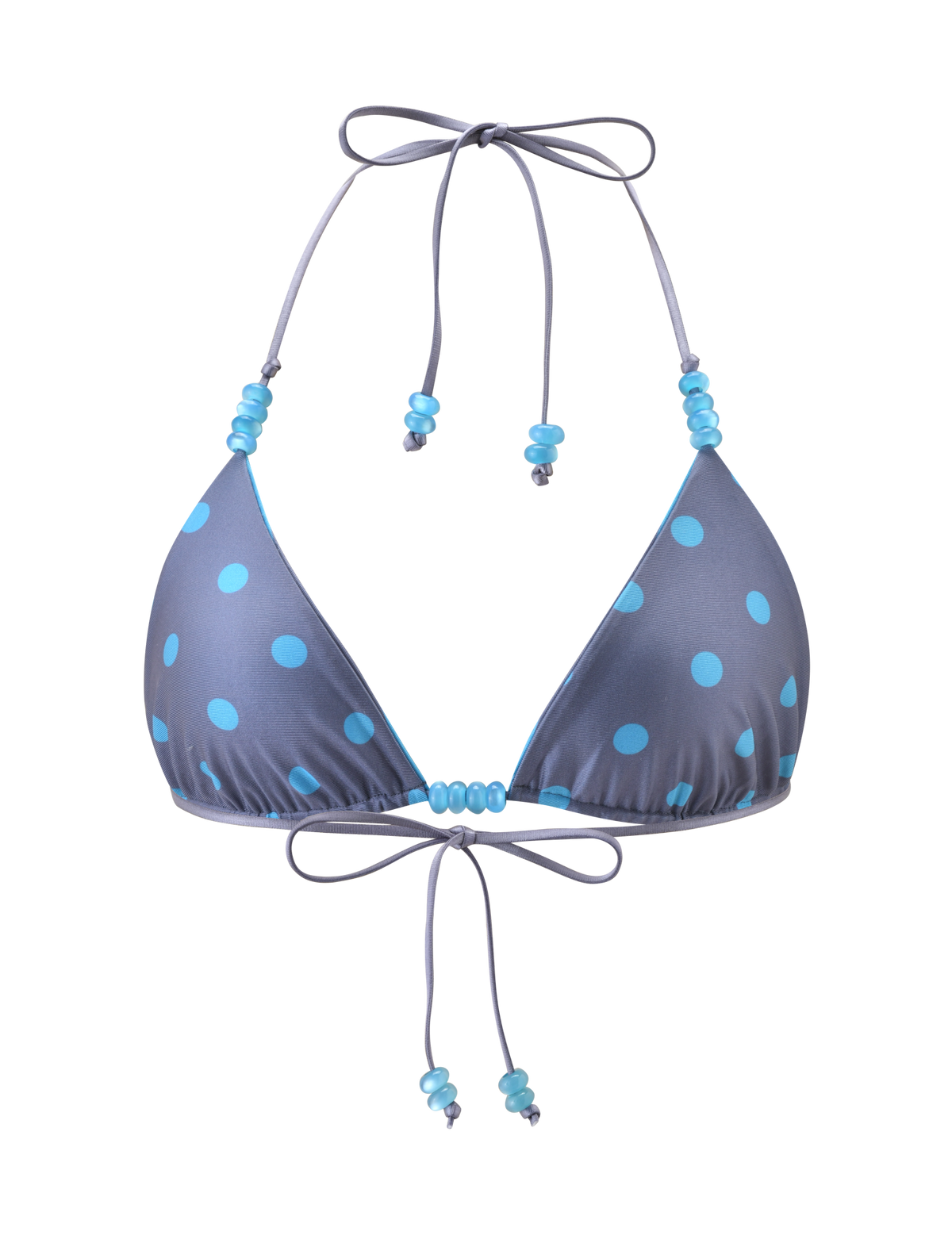 The FINLEA REVERSIBLE BIKINI TOP by TIGERMIST features a blue-grey dot and stripe pattern with an adjustable halter neck and back ties.