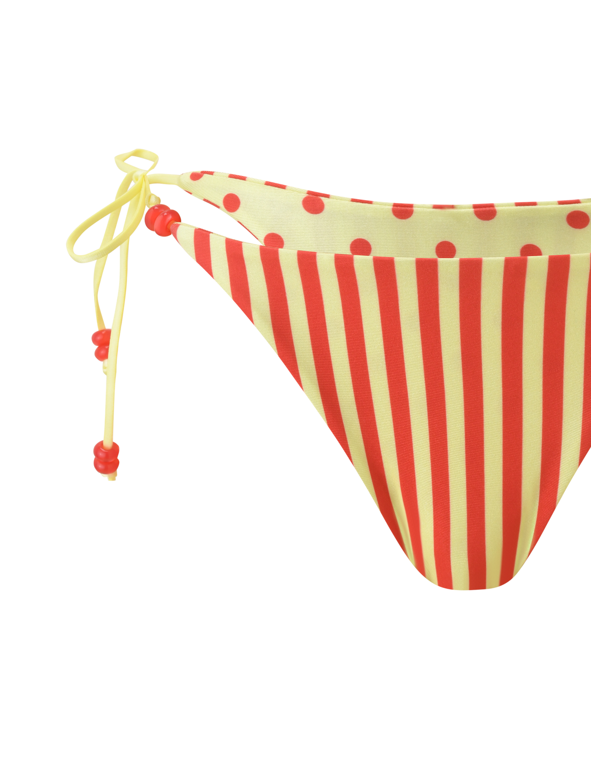 The TIGERMIST FINLEA REVERSIBLE BIKINI BOTTOM features a red and yellow dot and stripe design with cheeky, side tie cut and red bead accents, shown on a white background.