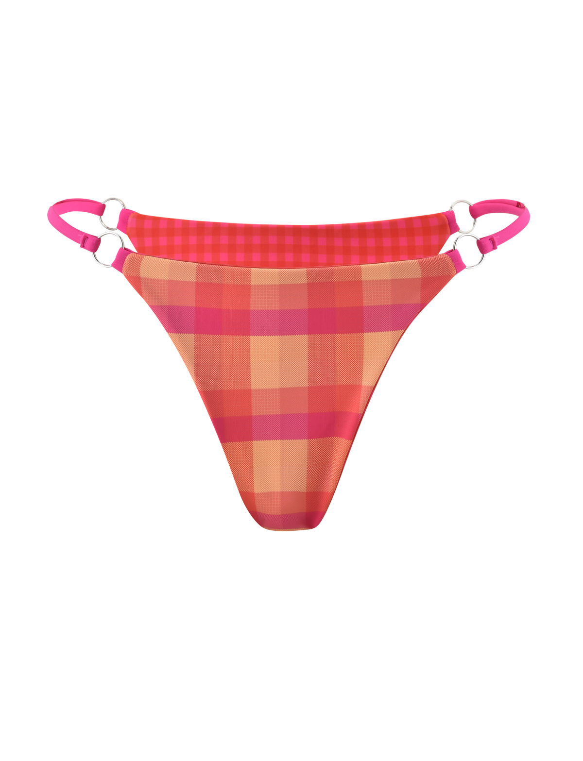 The TIGERMIST AYANNA REVERSIBLE BIKINI BOTTOM - GINGHAM AND RESORT PLAID features double adjustable pink side straps with silver rings and a vibrant pink and orange plaid pattern, shown on a white background.