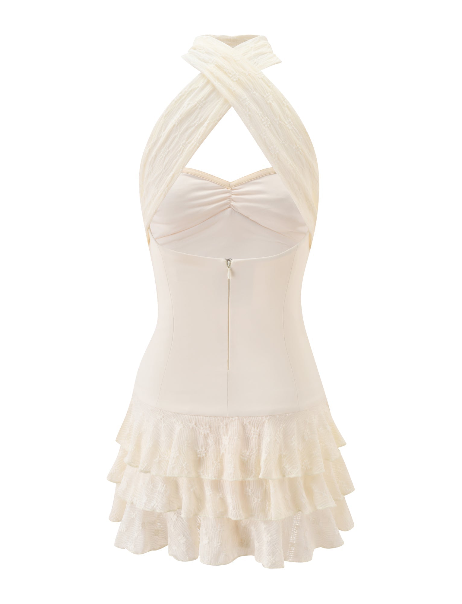 The LYRA MINI DRESS in cream by TIGERMIST features a sleeveless design with a crisscross halter neckline, fitted corset bodice, zipper back, and a tiered ruffled lace skirt. This dress offers a soft, elegant, and delicate look.