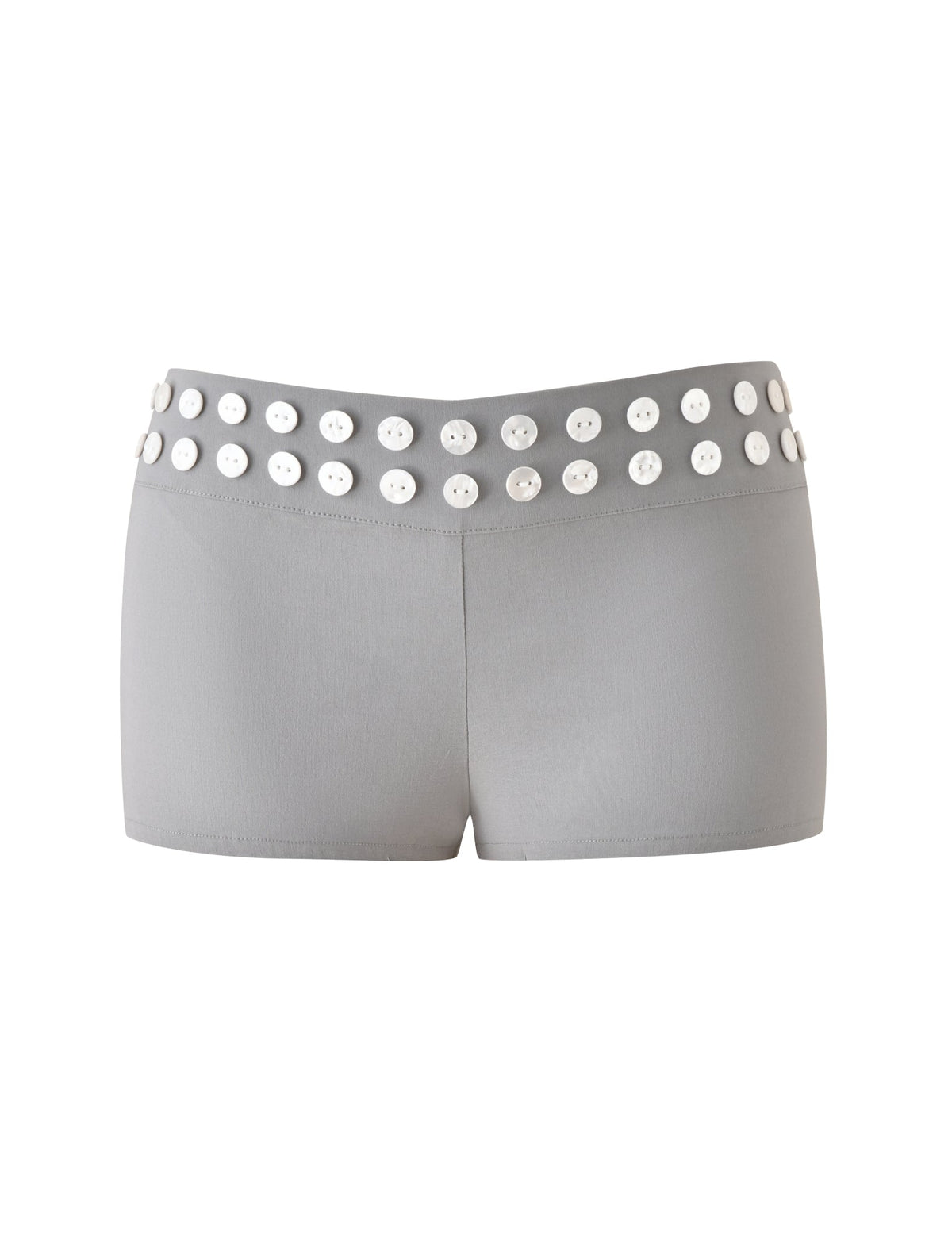 The SUKI SHORT - GREY by TIGERMIST is a grey, tailored mini short with a low-rise silhouette, featuring two rows of large faux shell buttons at the waistband, shown against a plain white background.