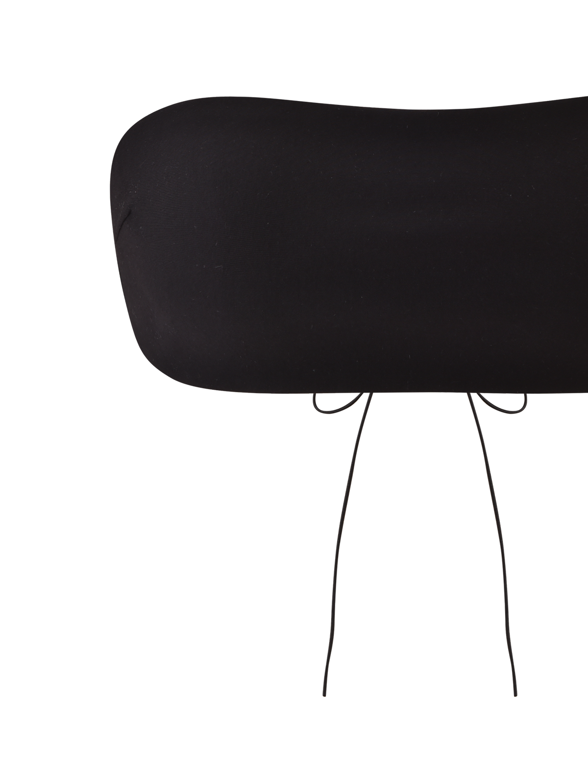 A minimalistic image of the TIGERMIST PILAR BANDEAU - BLACK, featuring its black, oblong, cushion-like design with lace-up detail on thin black metal legs, set against a plain white background.