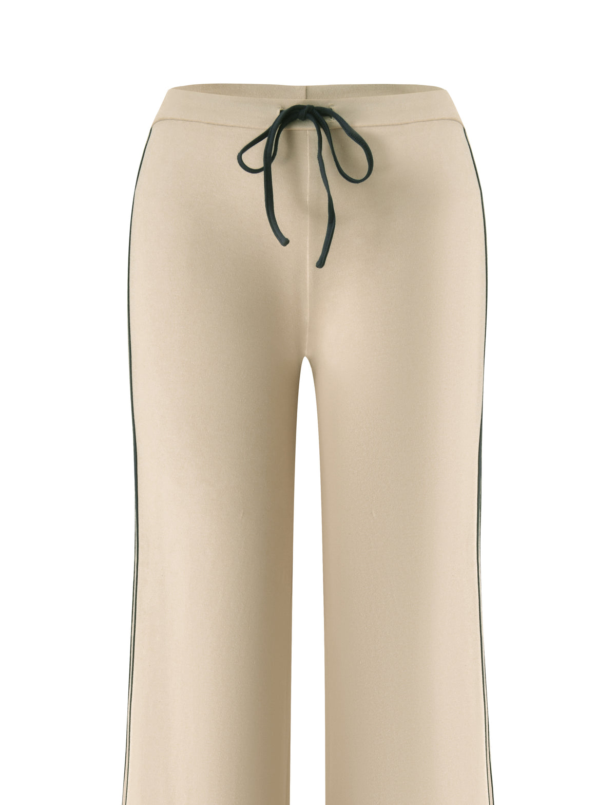 The SHANICE LOUNGE PANT - SAND by TIGERMIST is a beige wide-leg athletic lounge pant, crafted from stretch jersey fabric, featuring a black drawstring at the low-rise waist and black piping along the side seams, shown on a white background.