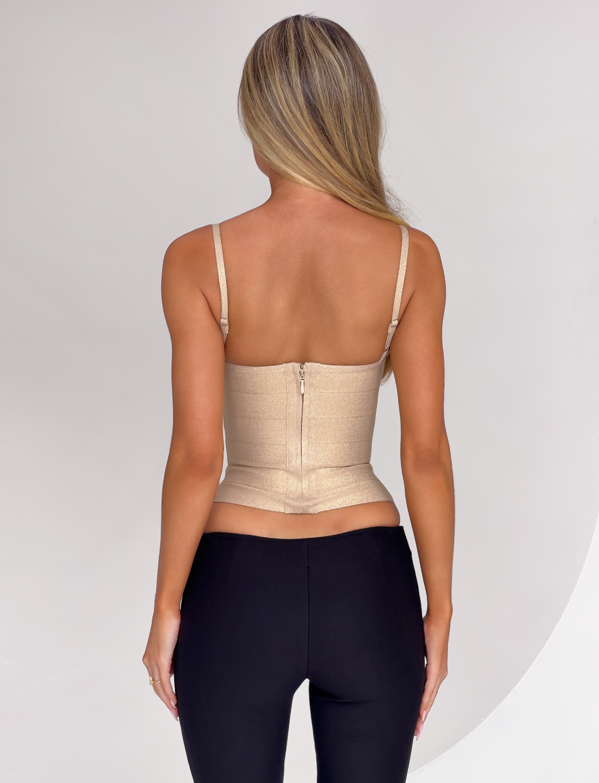 Tiger Mist Midori Shimmer Bandage Top in Gold Sparkle styled on a model, second angle