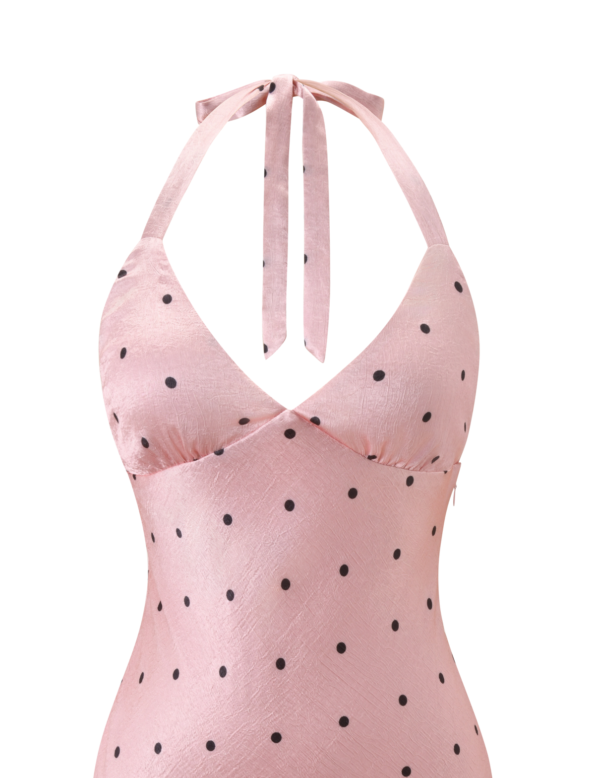 The TIGERMIST CINCIE MINI DRESS - PINK DOT is a playful light pink mini dress with black polka dots, featuring a halter neck, wrap-style bust, and a bow tied at the neck.