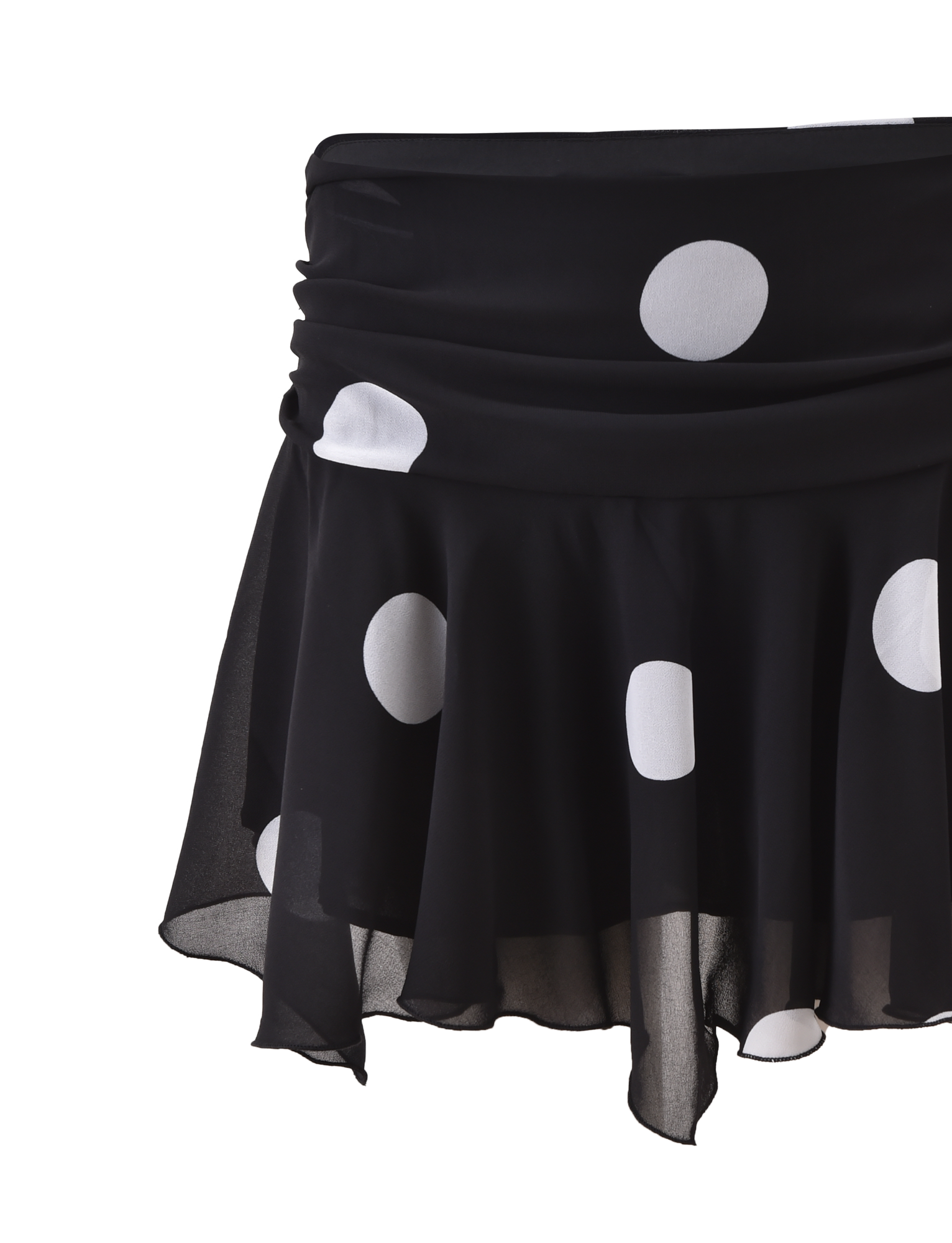The AYDIN MINI SKIRT by TIGERMIST is a black, semi-sheer chiffon mini skirt with large white polka dots, a draped waistband, and a flowy silhouette, shown against a plain white background.