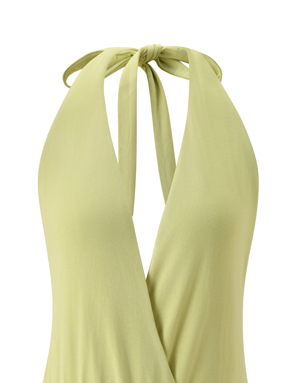 LYDIAH TOP - PISTACHIO in a green surplice halter style with a plunging neckline and tie closure at the neck.