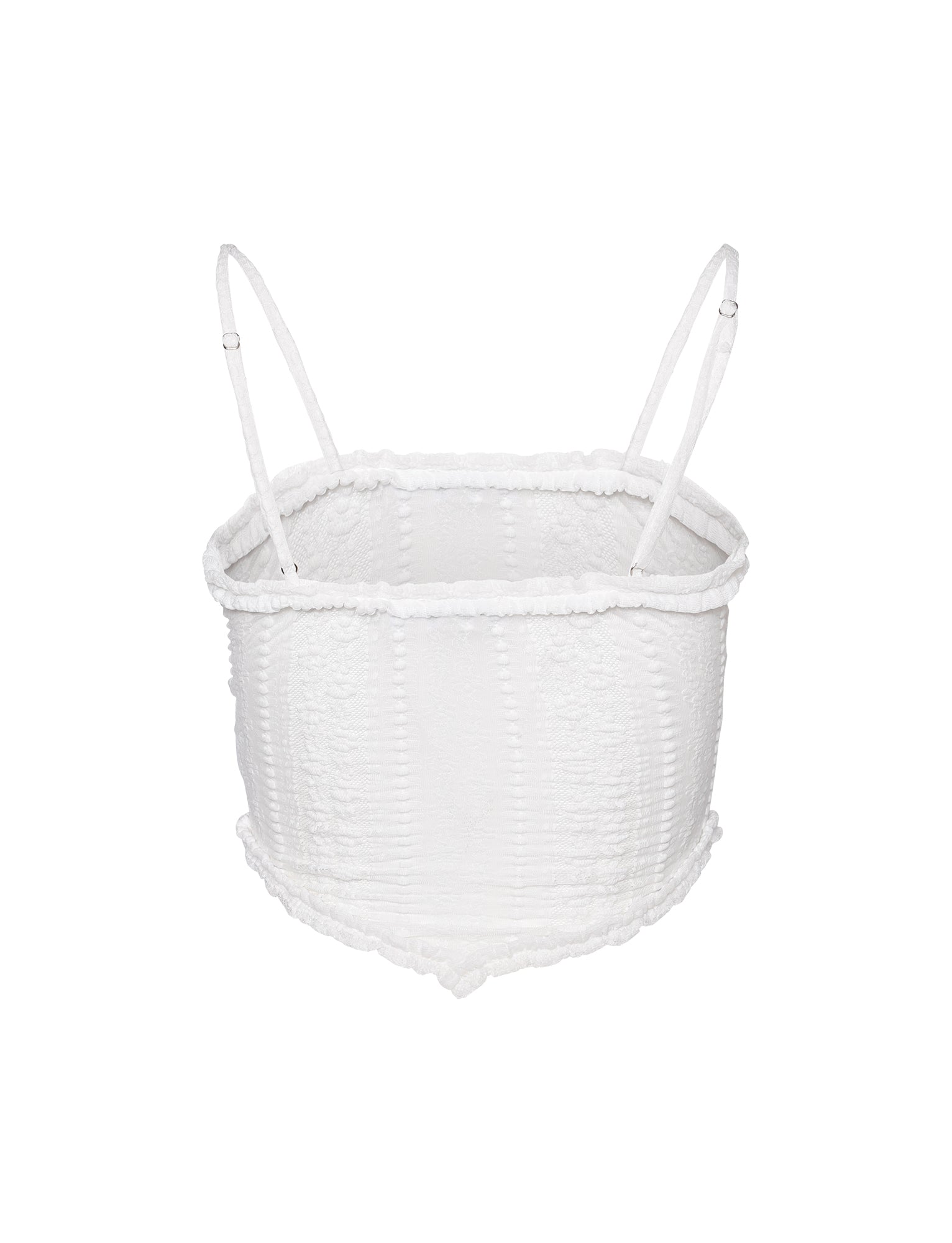 Introducing the SOPHA TWO PIECE TOP in white from TIGERMIST, a textured smocked crop top with spaghetti straps. It features a square neckline and elasticated detailing throughout for a stretchy fit, complemented by a slightly ruffled hem that adds a casual and stylish touch. Photographed against a plain white background.
