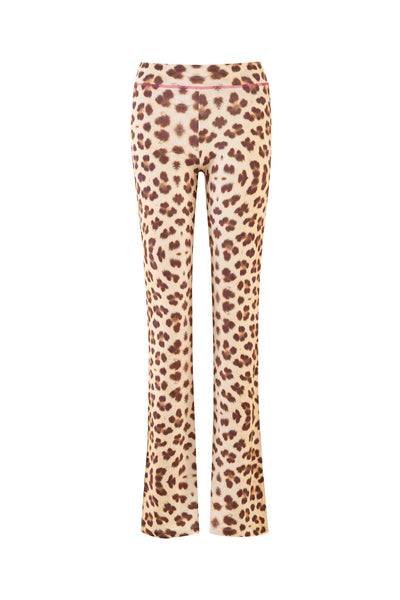 The I.AM.GIA BLARE TRACKPANT - NEUTRAL : LEOPARD : WILD CARD features a high waist and flared legs, with bold brown and black leopard spots on a beige base, shown against a white backdrop.