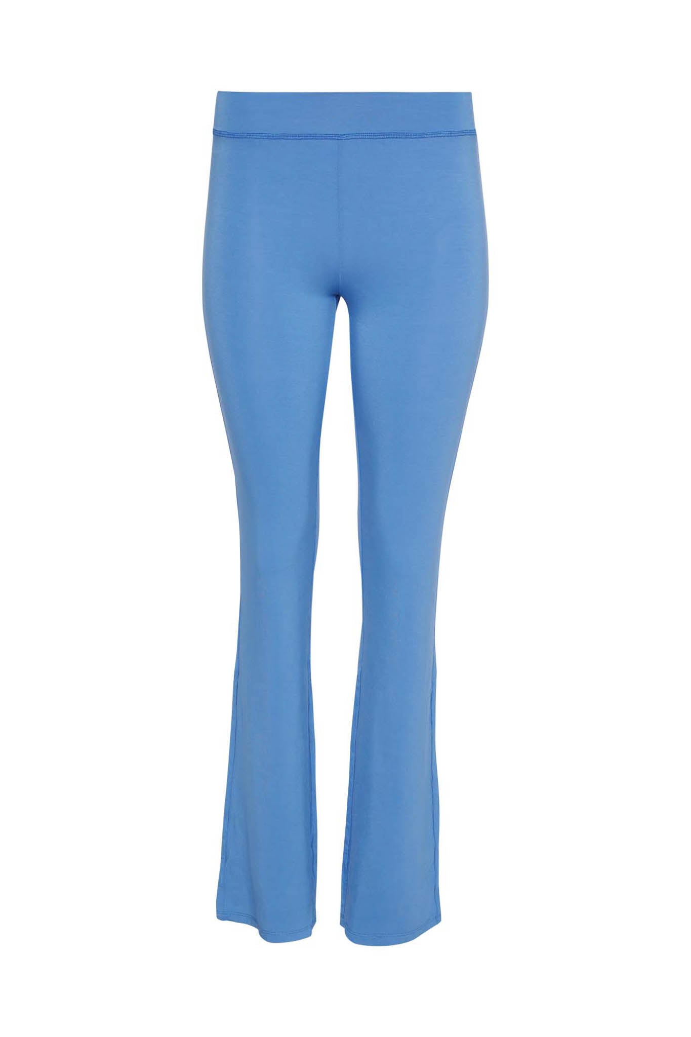 The BLARE TRACKPANT – BLUE by I.AM.GIA is shown against a white background, featuring a light blue, high-waisted design with a streamlined, bodycon fit and no visible pockets, buttons, or zippers.