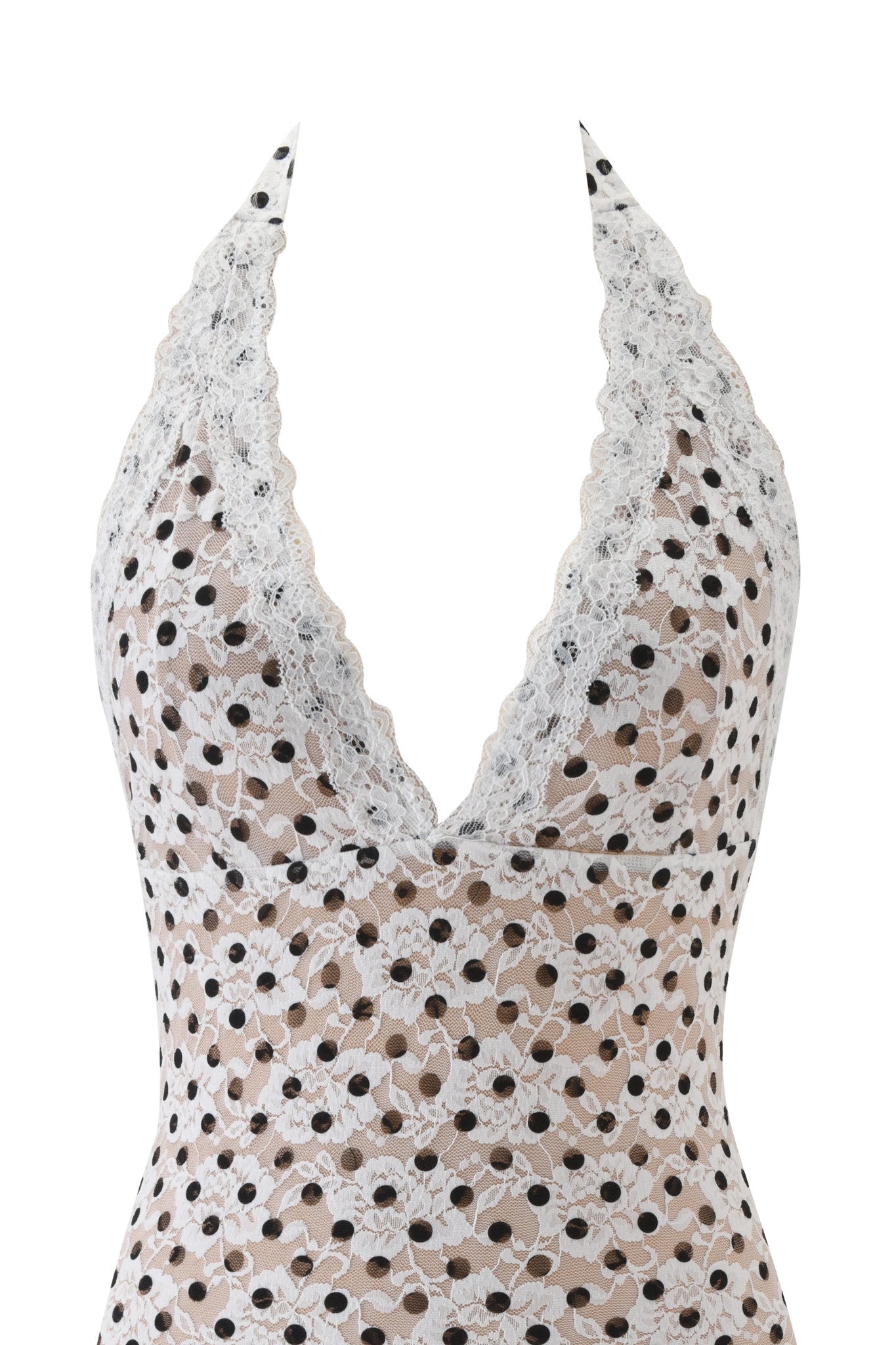 The GEM MINI DRESS by I.AM.GIA is a white lace halter dress with a plunging neckline, black polka dots, and scalloped edges, shown against a plain white background.