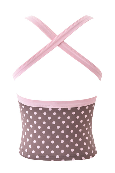 The I.AM.GIA BLARE HALTER STRAP TOP - PINK CHOCOLATE is a sleeveless tank with pink polka dots on brown, light pink trim, and crisscrossed pink back straps.