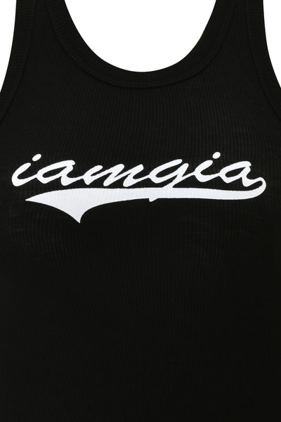 A close-up of the I.AM.GIA PENELOPE TANK - GIA LOGO, a black ribbed fitted top with "iamgia" in white cursive across the chest.