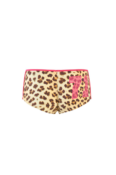 The I.AM.GIA JOANNE SHORT - NEUTRAL : LEOPARD : WILDCARD features a micro mini cut, custom leopard print, and a pink "74" on the left side, shown from the back against a white background.
