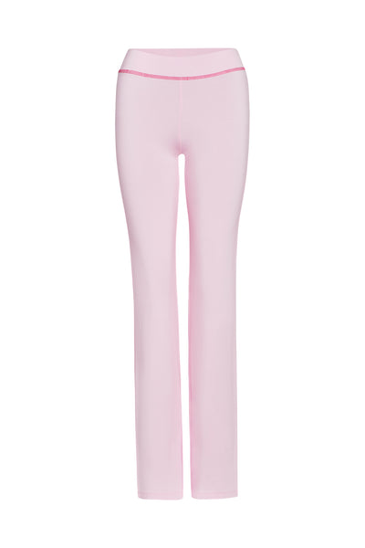 The I.AM.GIA BLARE TRACKPANT in pastel pink are high-waisted, full-length women's pants with a slim fit, shown on a plain white background.