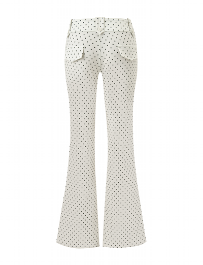 The TIGERMIST KITTIE PANT - CREAM DOT is a white high-waisted stretch suiting pant with black polka dots, two back flap pockets, and belt loops, shown from the back on a plain white background.