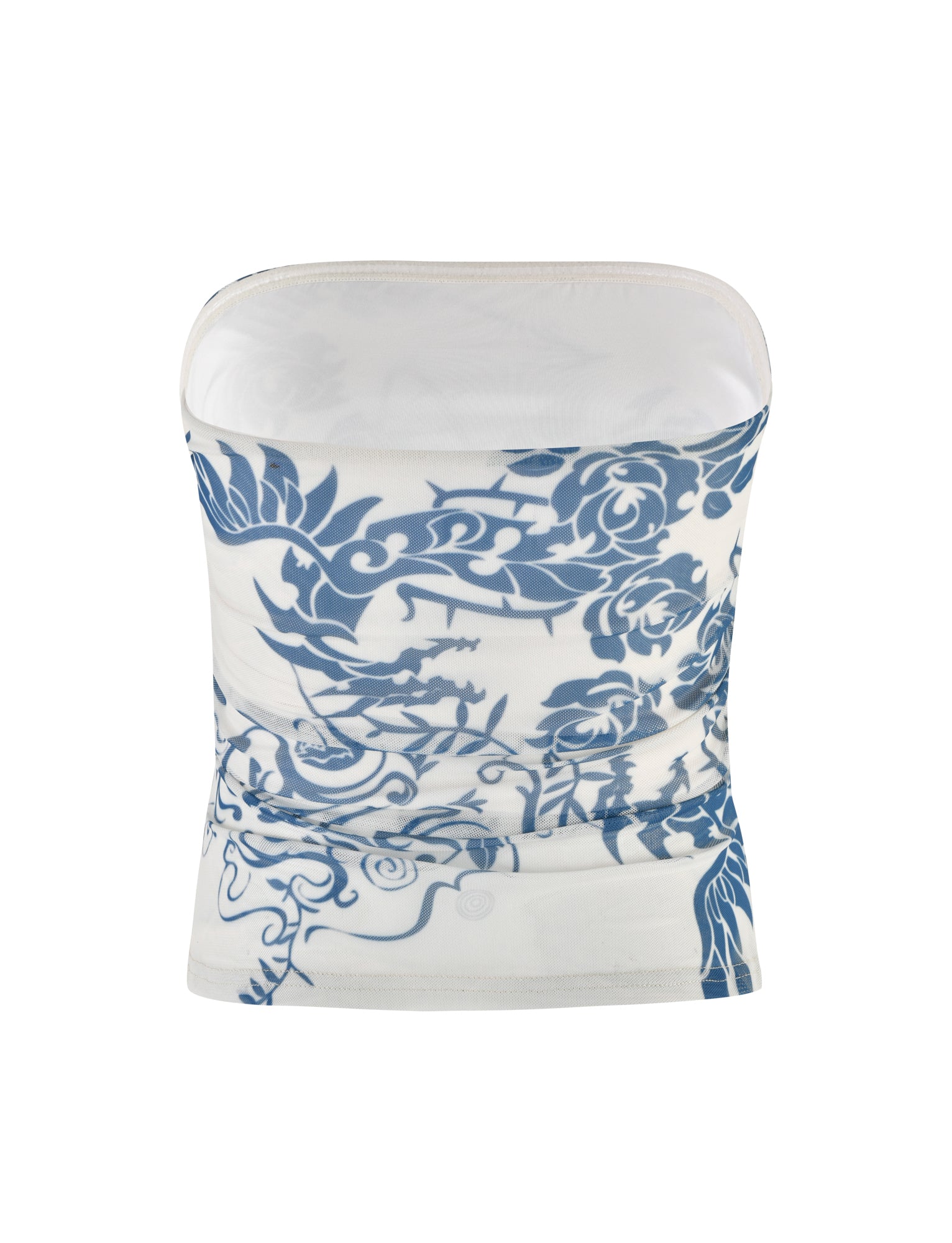 The HARRIETT TUBE TOP - BLUE : TATTOO : TATTOO PRINT from TIGERMIST features intricate floral and dragon designs in a predominantly blue pattern contrasted against white fabric. This versatile cylindrical gaiter can be worn for various purposes, including as a face covering or scarf.