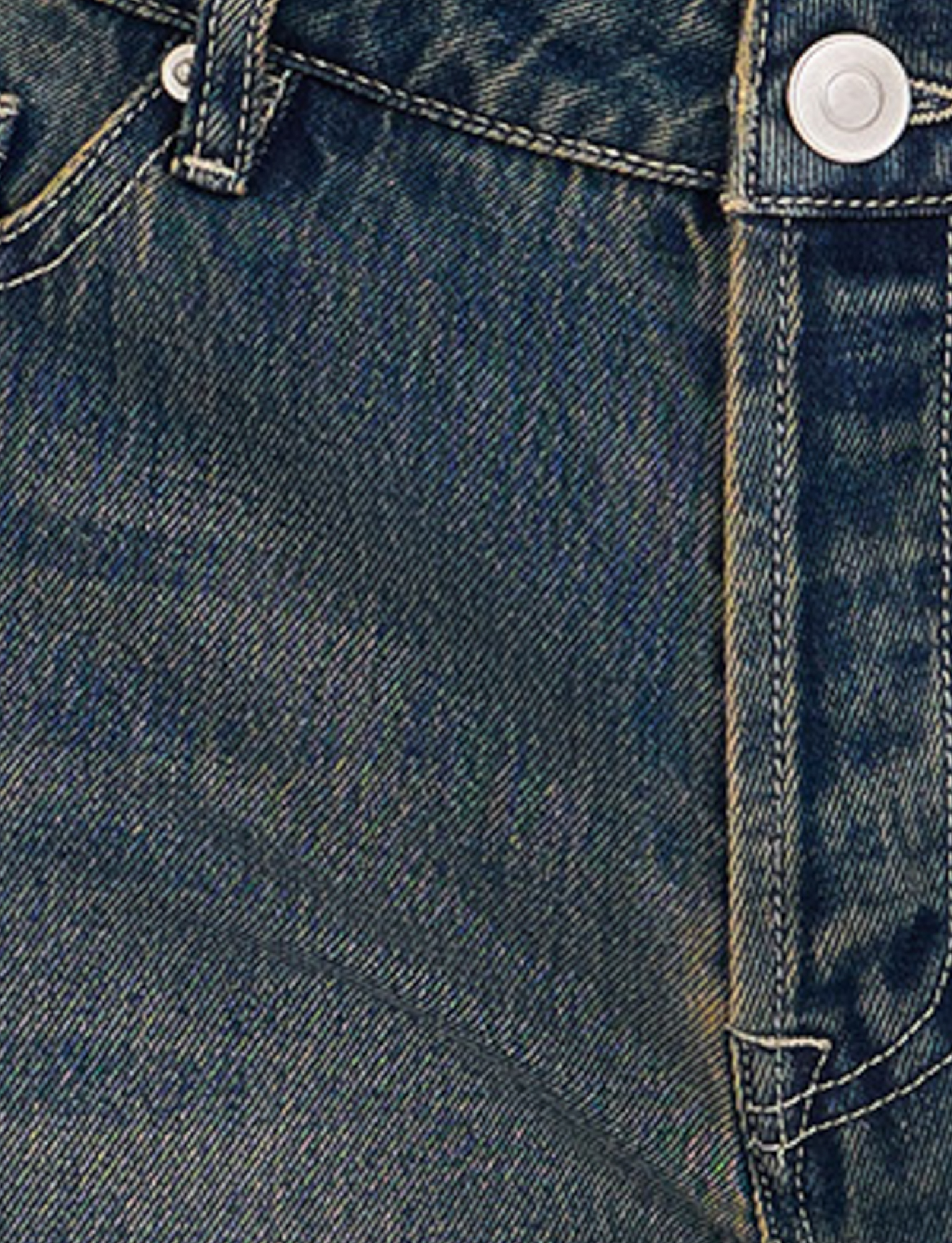 Close-up of TIGERMIST's FELIX JEAN - BLUE : MID WASH, featuring a metal button, belt loop, and gold stitching details on blue denim.