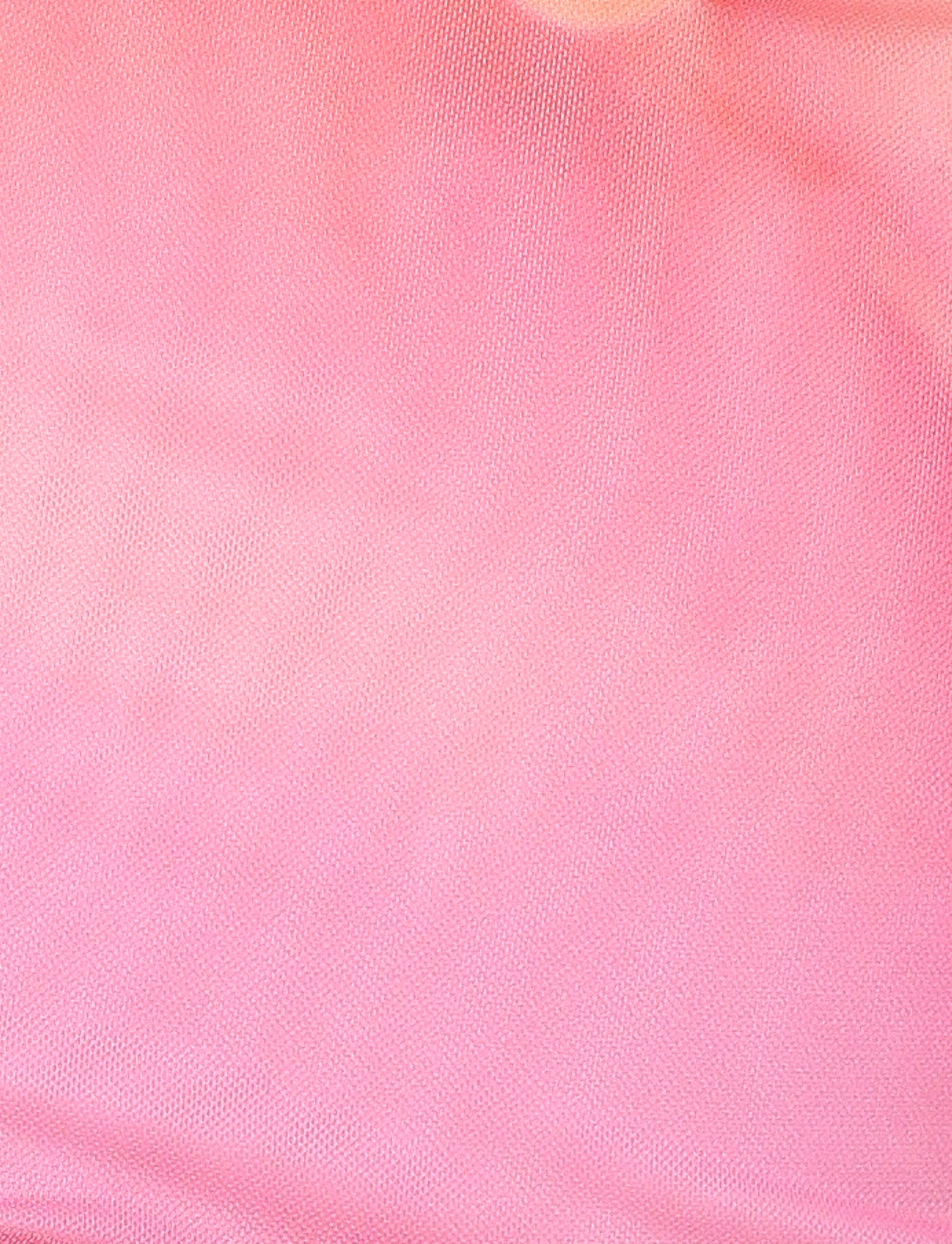 Close-up of the TIGERMIST CHER MINI DRESS - PINK HIBISCUS shows a soft, textured pink macro floral fabric with a subtle gradient and visible weave—ideal for its strapless mini silhouette. Surface is smooth, evenly lit.
