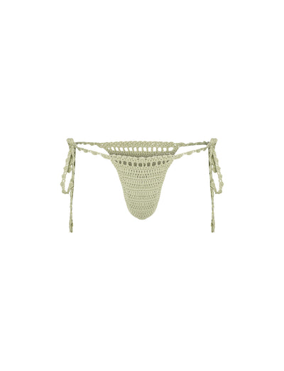 Introducing the Cora Bikini Bottom by TIGERMIST, now available in pastel green. This intricate design offers a mix of open and closed weave patterns for added texture and visual interest. Featuring adjustable braided side ties for a secure fit, this crochet thong perfectly combines functionality with style.