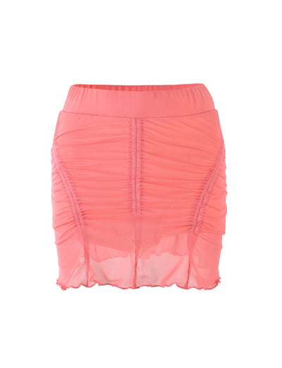The ESME SKORT in Coral Pink from TIGERMIST is a sheer mesh mini skort featuring ruched detailing on the front and back, along with a scalloped hem. It includes an elastic waistband for added comfort.