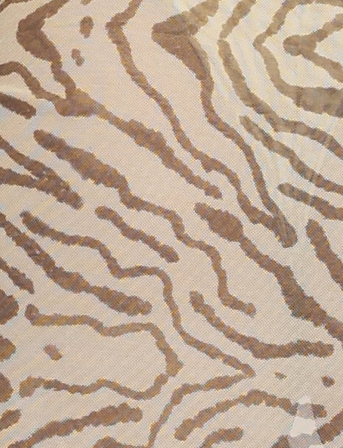 Close-up of the PEACHY SARONG - YELLOW : ZEBRA by TIGERMIST, showcasing a mesh fabric adorned with an abstract zebra print pattern in shades of tan, brown, and beige. The wavy lines mimic yellow zebra stripes, creating an organic, flowing design across the material. The texture appears to be soft and woven.