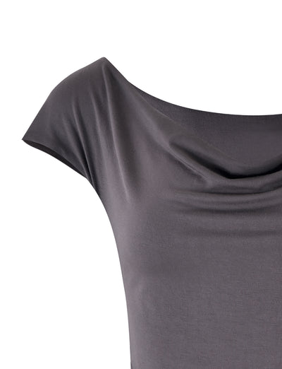 Close-up of the COBI JERSEY TANK - GREY : STEEL GREY from TIGERMIST, a short-sleeved top with a draped cowl neckline. The soft and smooth fabric creates gentle folds at the upper chest area. Only part of the front and shoulder of this elegant top is visible.