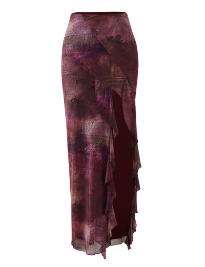 The TIGERMIST THEO SKIRT - PLUM BUTTERFLY PAISLEY is a high-waisted, long skirt with a butterfly paisley print, ruffled asymmetrical front slit, and flowy semi-sheer fabric.