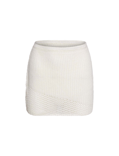 The MACAULEY MINI SKIRT by TIGERMIST is a white, textured crochet mini skirt with a bodycon fit, shown against a plain white background.
