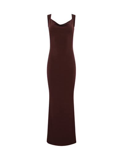 The MORANA DRESS - BROWN : CHOCOLATE from TIGERMIST is a full-length, sleeveless brown dress that features a fitted silhouette and a draped neckline. Extending to the ankles, the dress is displayed against a plain white background.