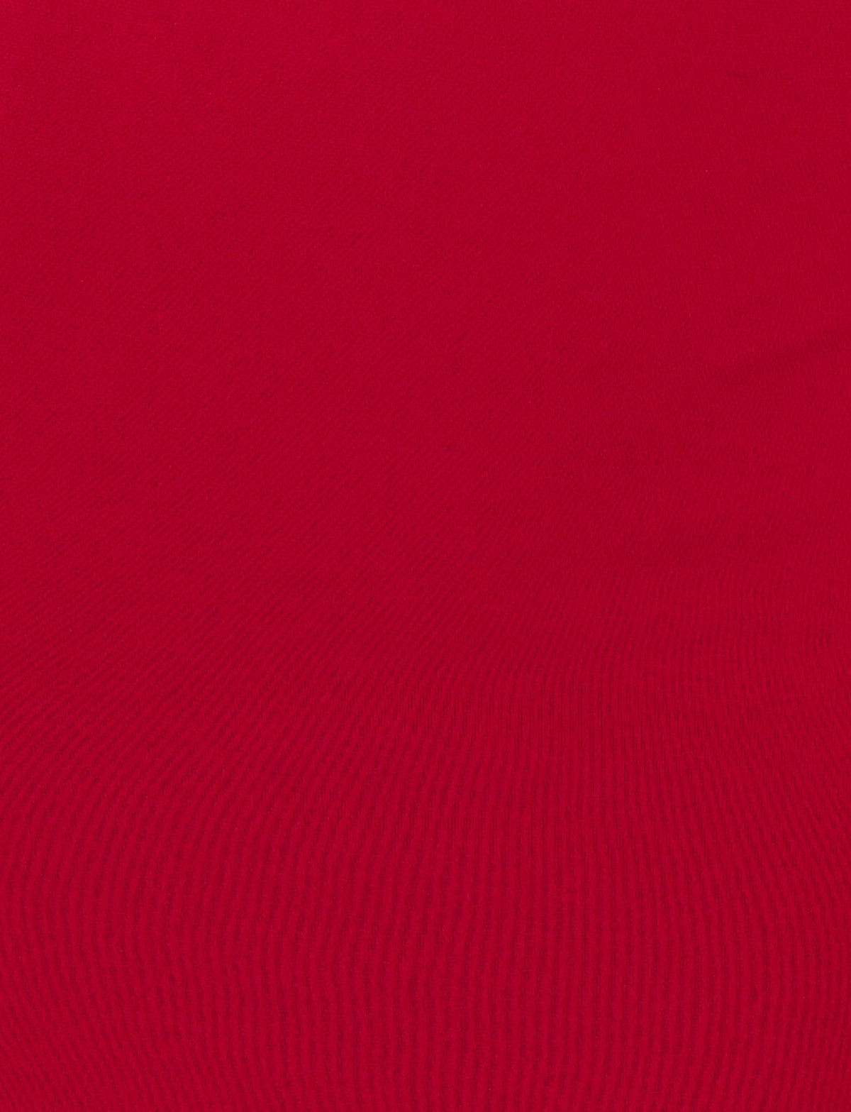 The vibrant cherry red hue of the Morana Mini Dress by TIGERMIST features a textured surface with subtle horizontal lines, creating a ripple effect. This uniform pattern evokes the elegance of a cowl neckline and enhances the dynamic appeal of a mini silhouette.