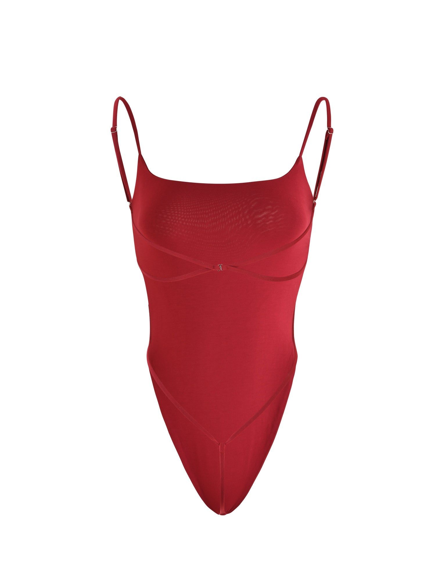 The MINERVA BODYSUIT - RED from TIGERMIST is a sleeveless bodysuit with thin, adjustable spaghetti straps and a rounded neckline. It boasts a form-fitting design with asymmetrical seam detailing. The smooth and stretchy fabric is ideal for intimate or fashion wear.