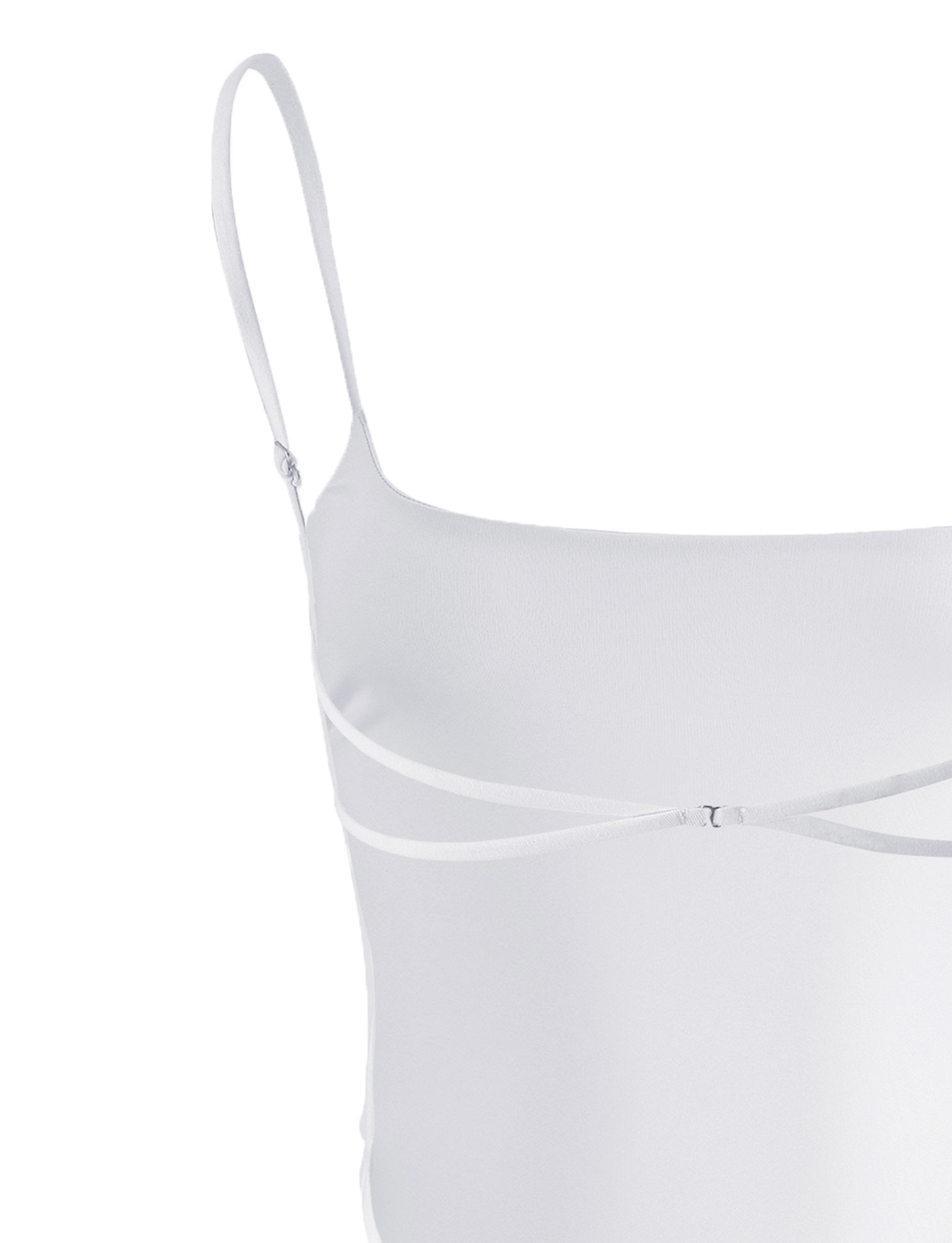 The MINERVA BODYSUIT - WHITE by TIGERMIST is sleeveless with thin spaghetti straps, a diagonal front strap detail, and a flattering bodycon fit.
